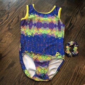 plum gymnastics leotard with matching scrunchie